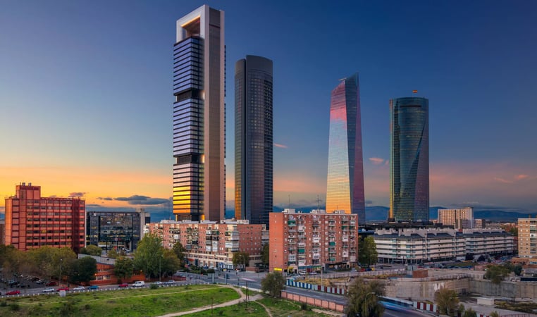 adobestock_127215648-image-of-madrid-spain-financial-district-with-modern-skyscrapers-during-sunset.jpeg
